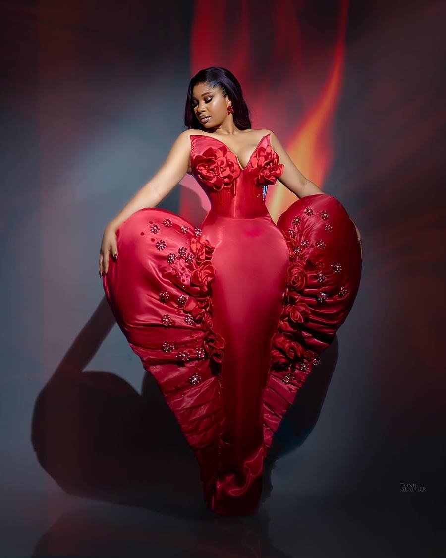 The Heart, a sculptural crimson gown shaped as a heart silhouette