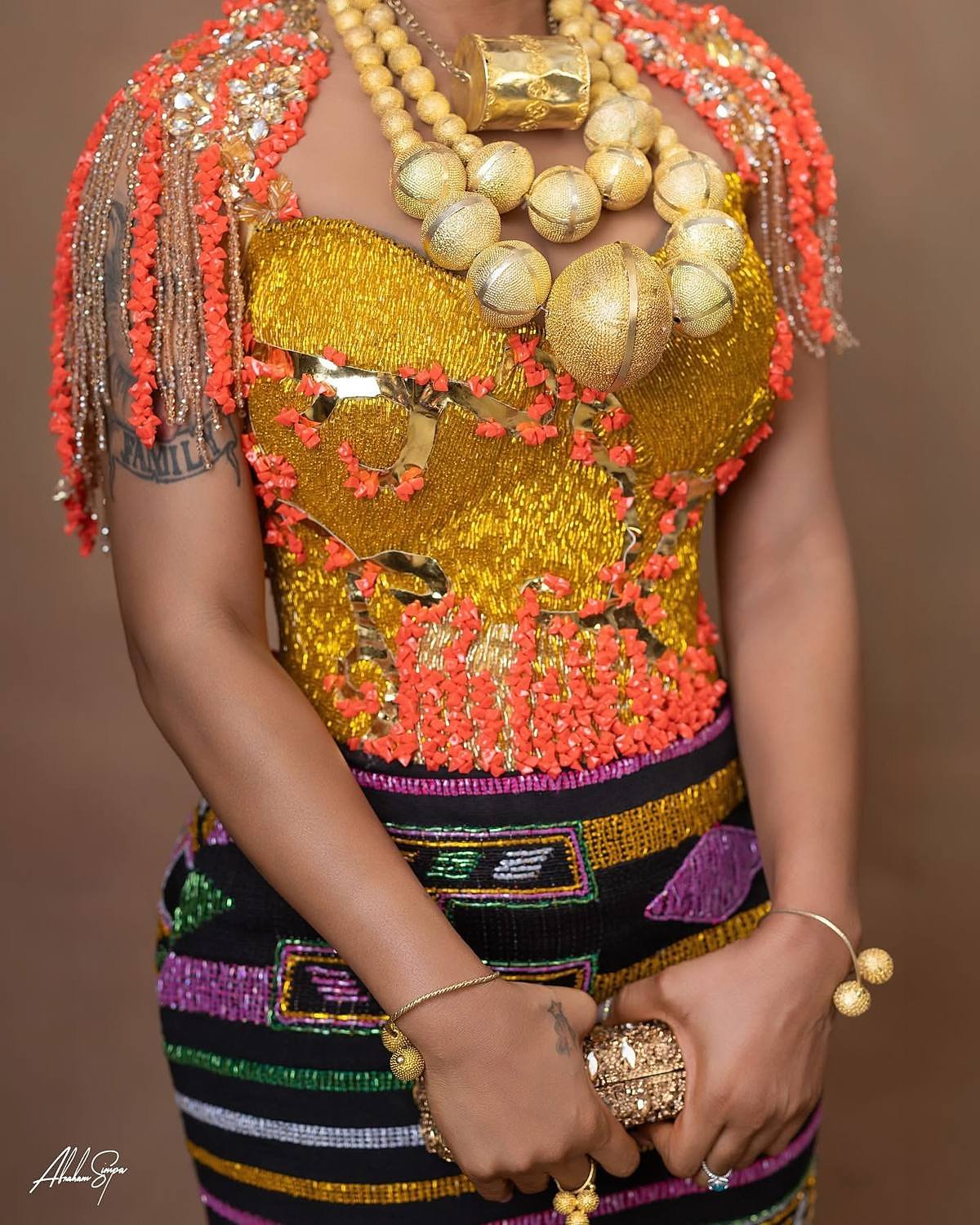 Gold beadwork fused with traditional coral jewelry