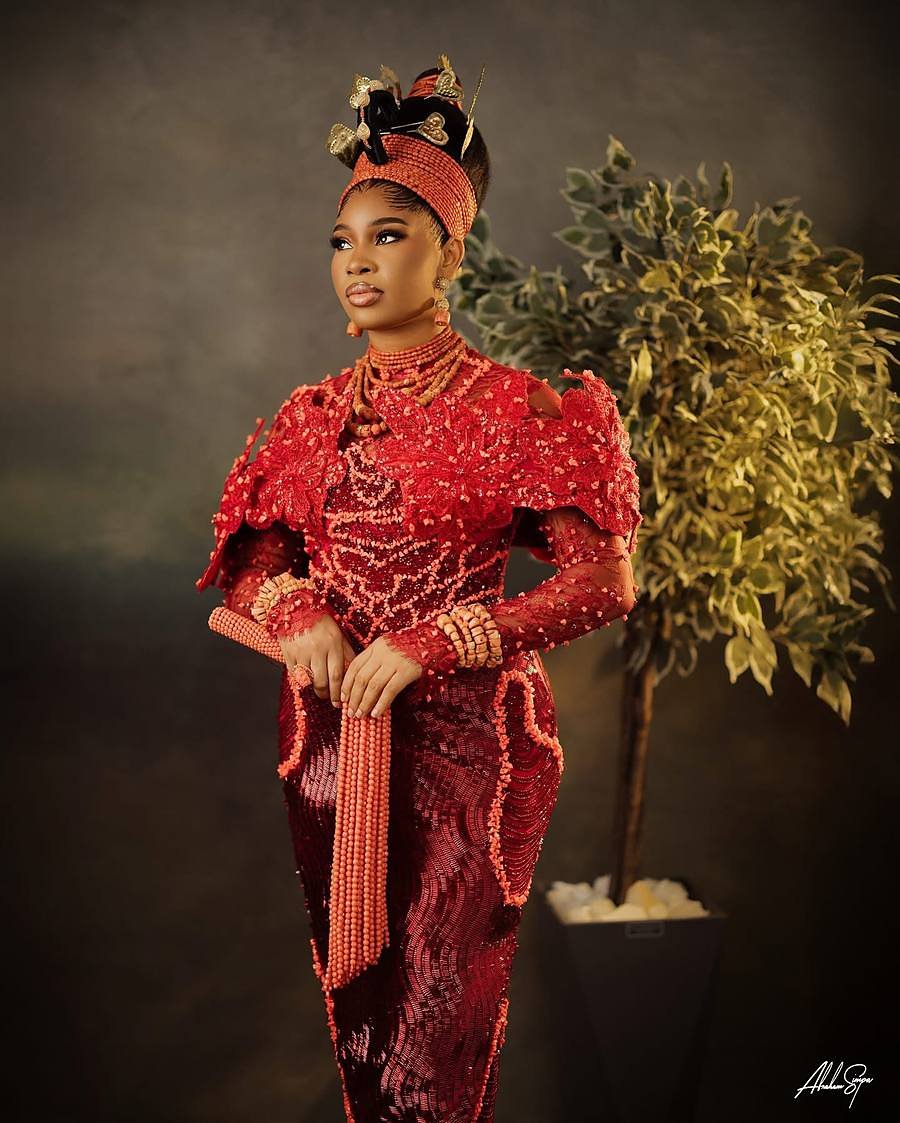 Coral fringe ceremonial couture portrait