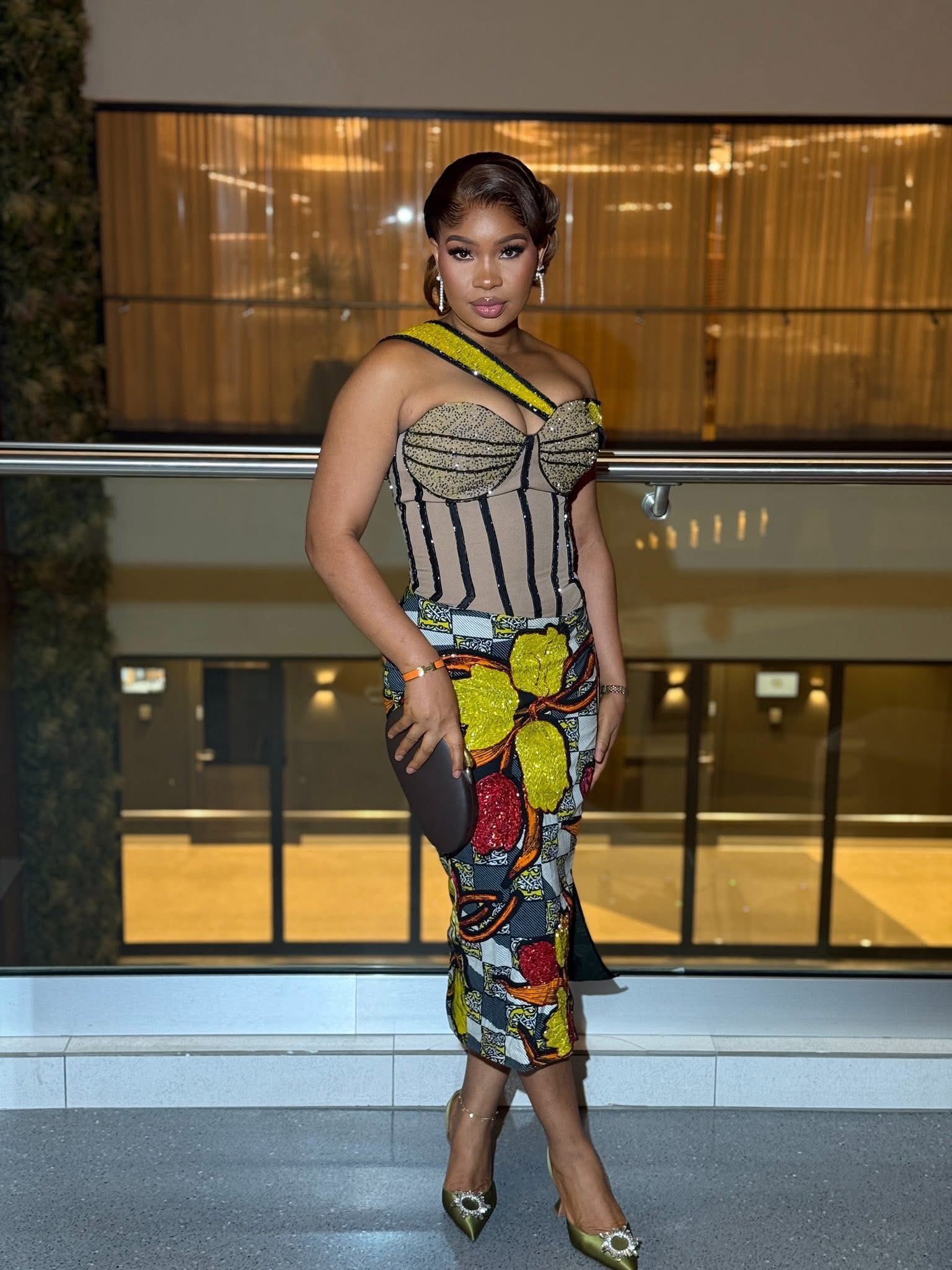 Gold and emerald traditional celebration ensemble