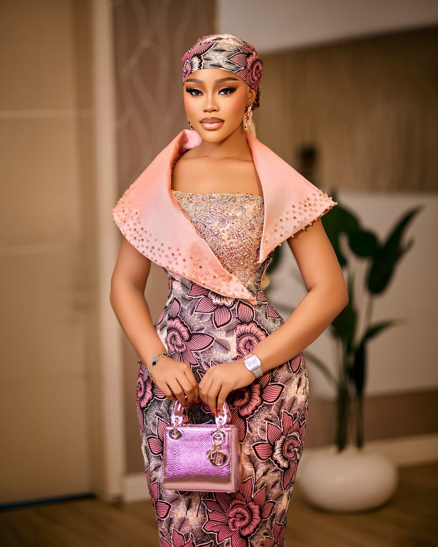 Copper metallic wrap gown with draped shoulder detail